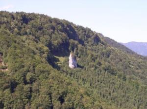 Orlova peč (Eagle's rock) at Čreta is well seen from valley
